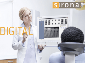 A dentist discussing digital X-rays with a patient