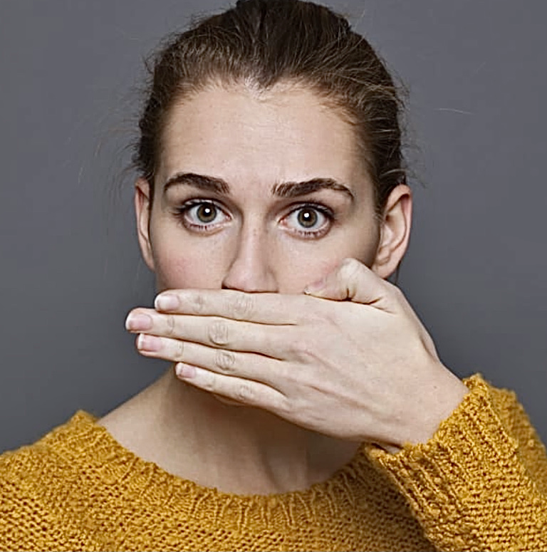 Woman  covering  her  mouth
