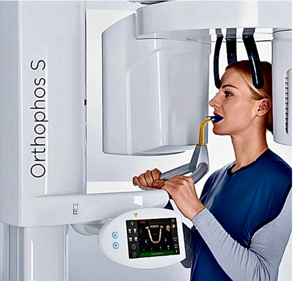 Patient undergoing panoramic dental X-ray with Orthophos S machine at ProCare Dental in Morton Grove