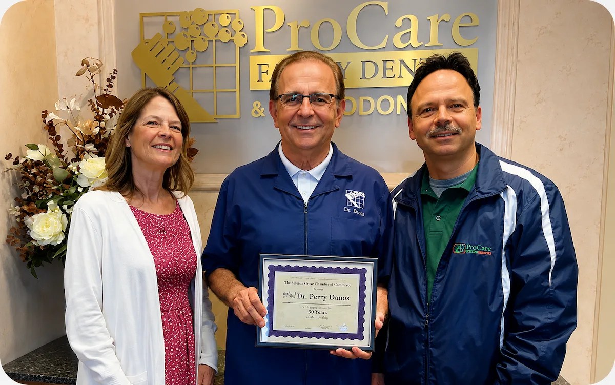 Dr. Perry Danos receiving recognition for 30 years of membership with the Morton Grove Chamber of Commerce at ProCare Family Dental in Morton Grove, Illinois.